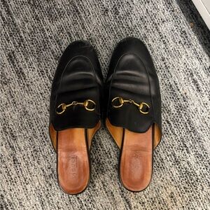 Gucci Black Mules with Gold Accent